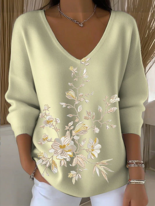 Damski sweter z żółtym haftem kwiatowym z dekoltem w szpic