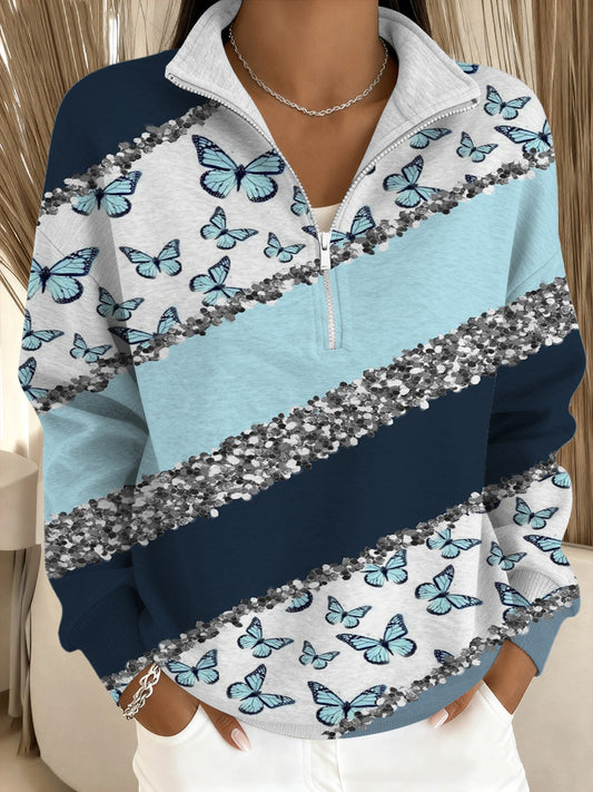 Damska błyszcząca niebieska bluza w paski ze stand-kołnierzykiem