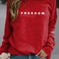 Damska swobodna bluza z nadrukiem amerykańskiej flagi „ Wolność nie jest darmowa”