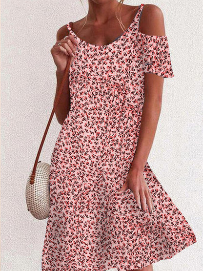 Damska sukienka z motywem kwiatowym w stylu retro