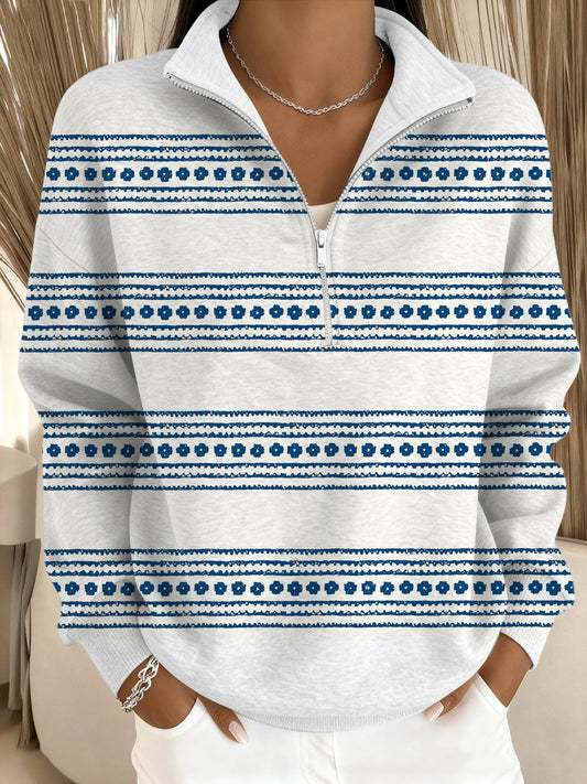 Damska delikatna niebieska bluza ze stójką