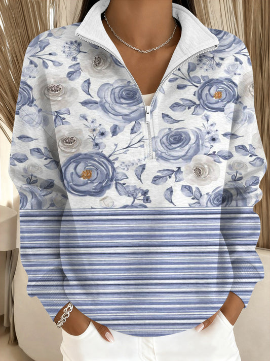 Urocza niebieska bluza ze stójką w kwiaty i paski